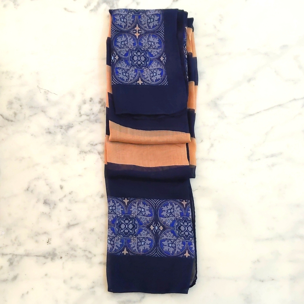 NWOT. The Limited 100% Rayon large scarf/wrap with multi color and patterns.